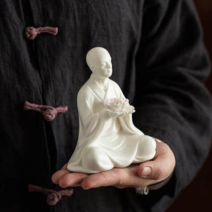 Buddha Statue Incense Stick - Tibetan Buddhist statue, close-up detail