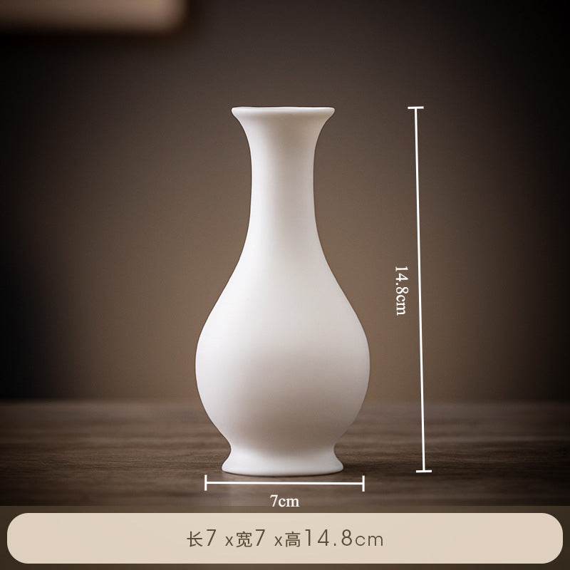 Ceramic Small Vase - Tibetan Buddhist statue, close-up detail