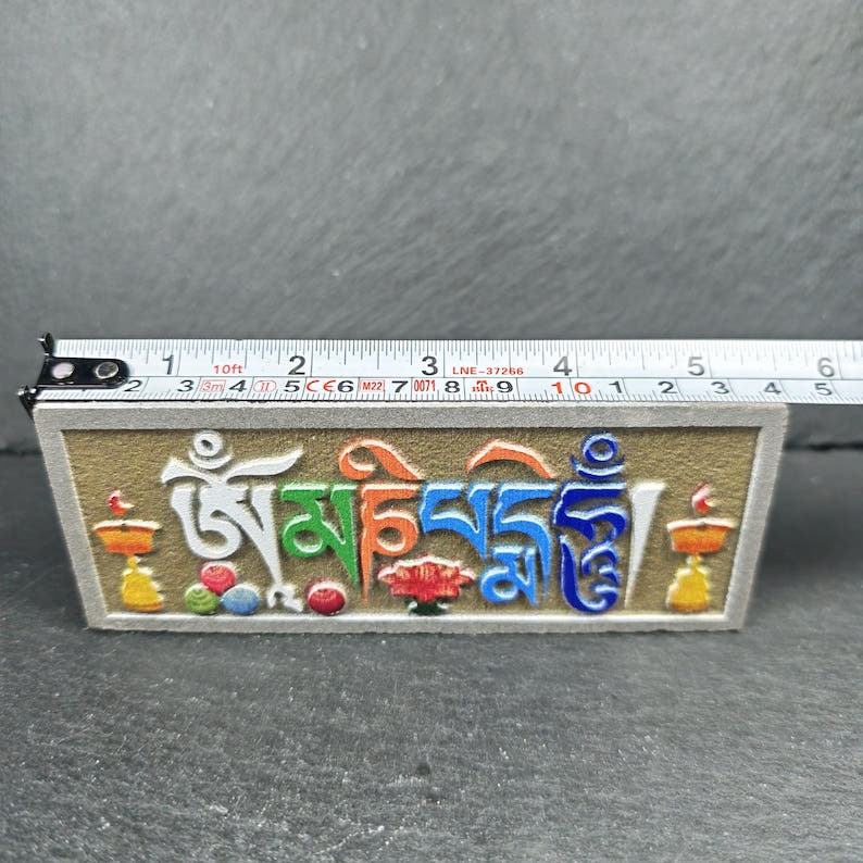 6 Mantras Stones - Artisanal Hand-Carved Mani Stones - Tibetan Buddhist art, close-up detail