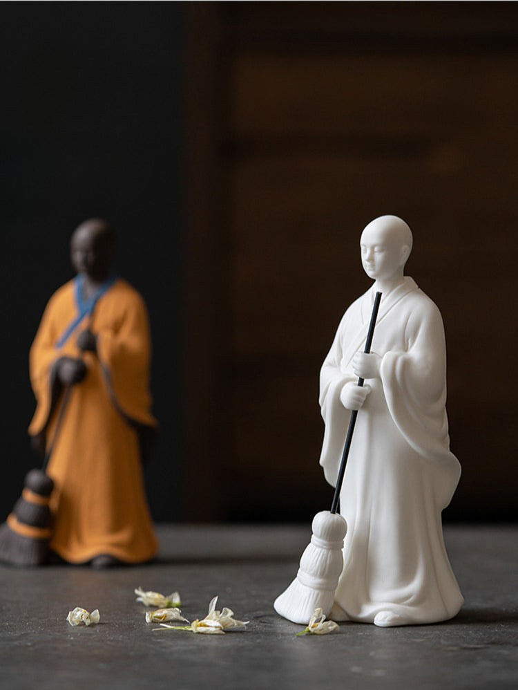 Sweeping Monk Buddha Statue