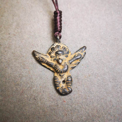 Buddhist Amulet Pendant,Garuda,Garula,Suparn Bird - Tibetan Buddhist amulet, close-up detail