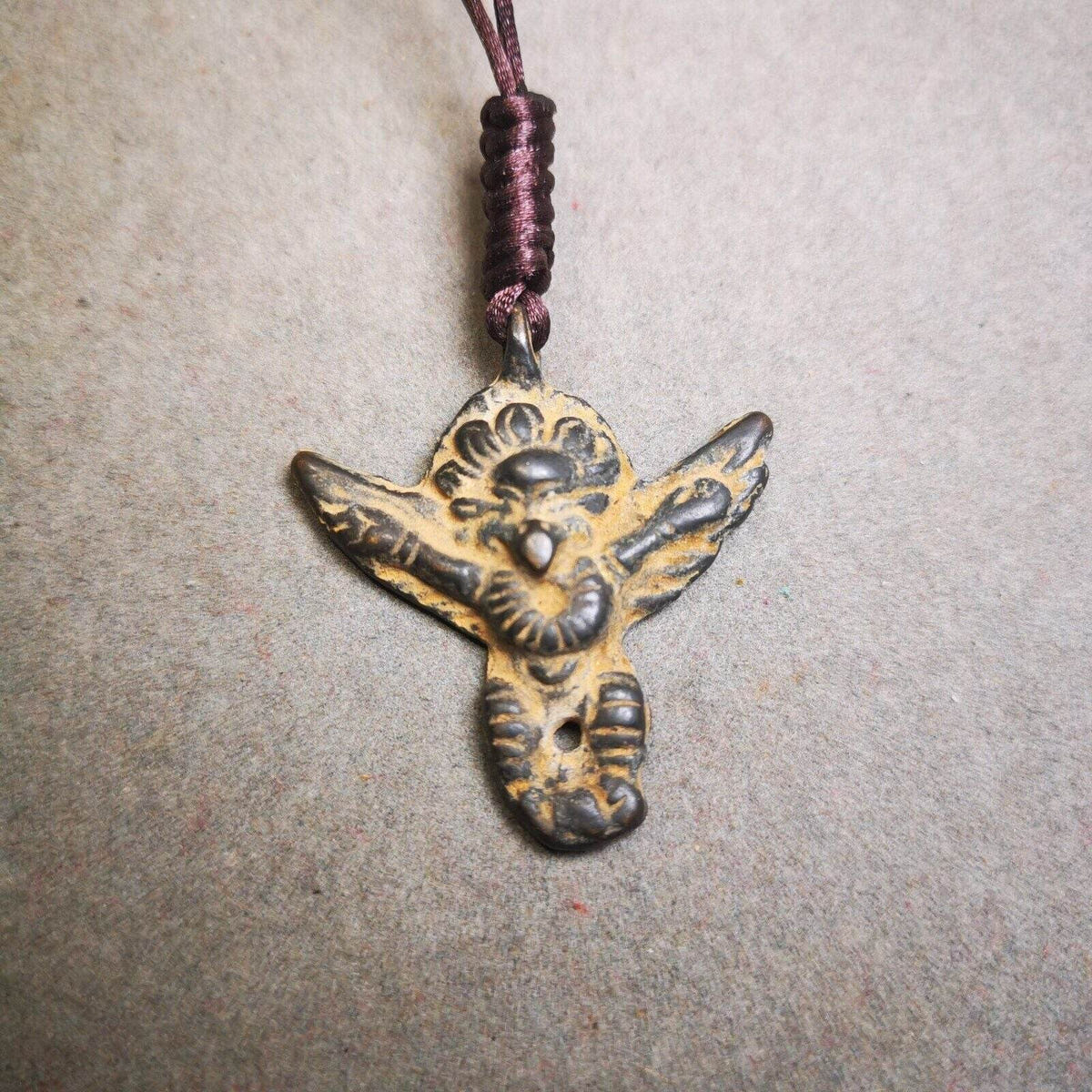 Buddhist Amulet Pendant,Garuda,Garula,Suparn Bird - Tibetan Buddhist amulet, close-up detail