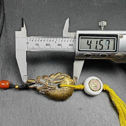 Amulet, Dragon Charm Pendant - Tibetan Buddhist amulet, size reference