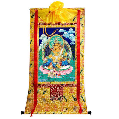 Yellow Jambhala - Tibetan thangka painting, close-up detail