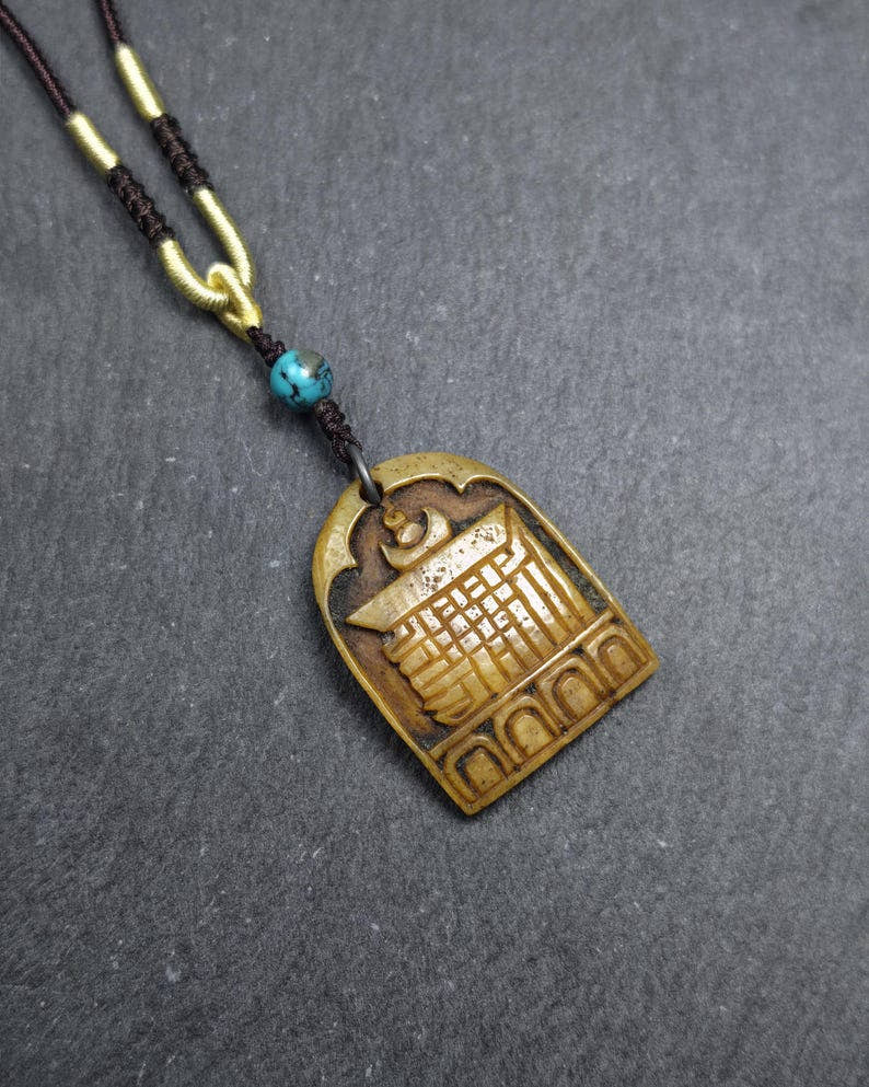 Antique Kapala Amulet Tenfold Auspicious Diagram - 35mm - Tibetan Buddhist amulet, front view