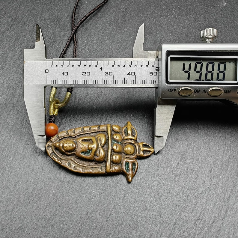 Tibetan Buddhist Amulet - Tibetan Buddhist amulet, size reference