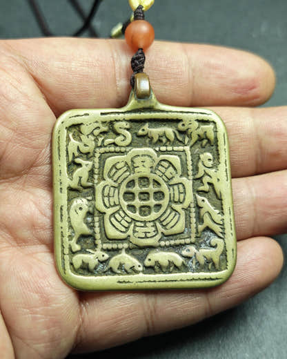 Tibetan Calendar Badge - SIPAHO srid pa ho Amulet - Tibetan Buddhist amulet, close-up detail