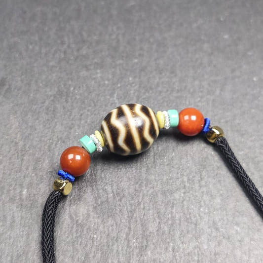 Authentic Dalo Dzi Bead Necklace - Round Wave Dzi - Tibetan Buddhist bead necklace, front view