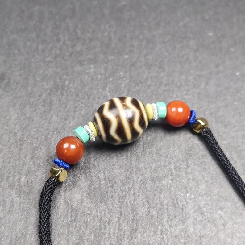 Authentic Dalo Dzi Bead Necklace - Round Wave Dzi - Tibetan Buddhist bead necklace, front view