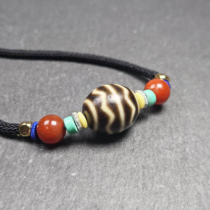 Authentic Dalo Dzi Bead Necklace - Round Wave Dzi - Tibetan Buddhist bead necklace, close-up detail