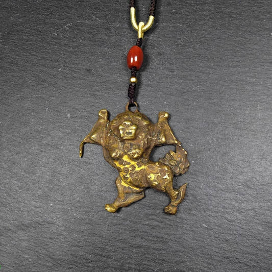 Authentic Tibetan Snow Lion Amulet - Tibetan Buddhist amulet, front view