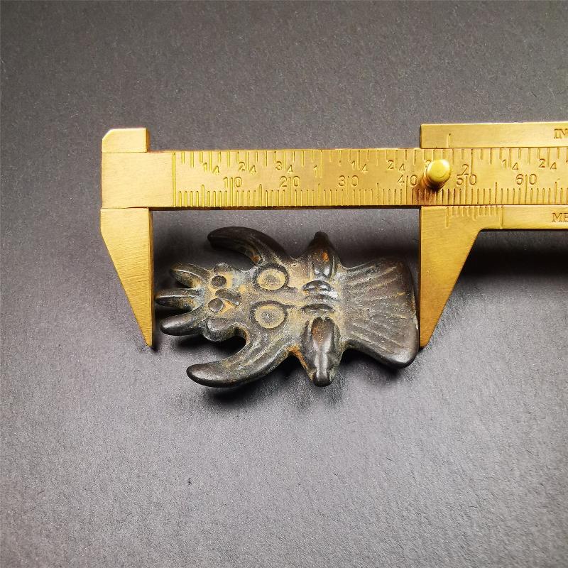 Garuda Amulet - 1.8" - Tibetan Buddhist amulet, size reference