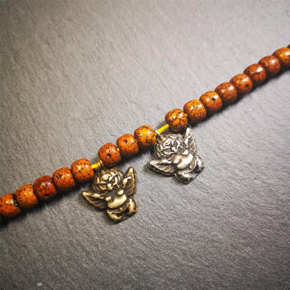 Garuda Amulet Pendant- 0.8" - Tibetan Buddhist amulet, close-up detail