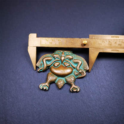 Garuda Amulet - 2.28" - Tibetan Buddhist amulet, size reference