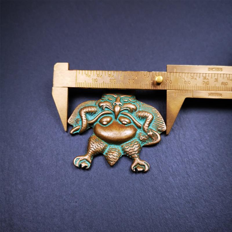 Garuda Amulet - 2.28" - Tibetan Buddhist amulet, size reference