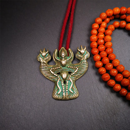 This Garuda is collected from Yaqing Monastery Baiyu County Tibet,it's a handmade badge,amulet pandent, made of copper,about 80 years old.  You can wear it as amulet pendant, or make it into wall decoration, hang on the door as a protector,or just put it on your desk,as an ornament.