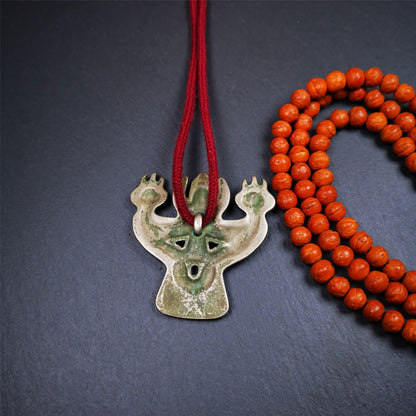 This Garuda is collected from Yaqing Monastery Baiyu County Tibet,it's a handmade badge,amulet pandent, made of copper,about 80 years old.  You can wear it as amulet pendant, or make it into wall decoration, hang on the door as a protector,or just put it on your desk,as an ornament.