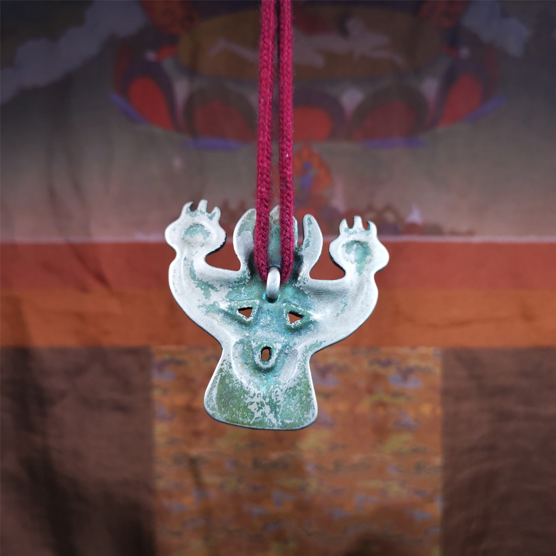 This Garuda is collected from Yaqing Monastery Baiyu County Tibet,it's a handmade badge,amulet pandent, made of copper,about 80 years old.  You can wear it as amulet pendant, or make it into wall decoration, hang on the door as a protector,or just put it on your desk,as an ornament.