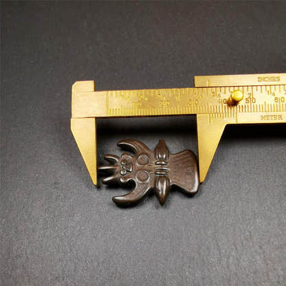 Garuda Amulet - 1.38" - Tibetan Buddhist amulet, size reference