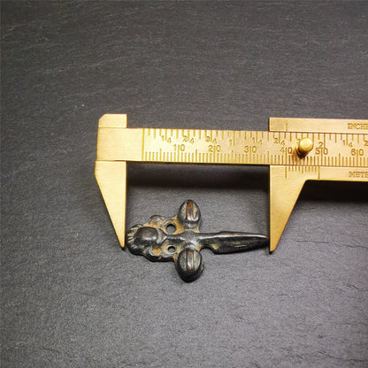 Gandhanra Tibetan Buddhist Ritual Implement - Kila -Dorje Phurba amulet pendant,a cross vajra in the middle,made of thokcha,black color, length about 1.57", handmade by Tibetan craftsmen from Tibet in 1960's.