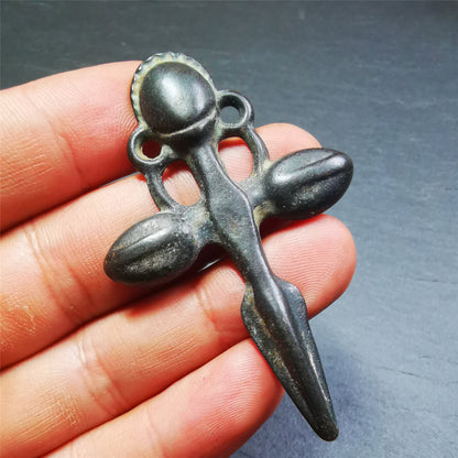 This beautiful phurba pendant is hand carved by Tibetan craftsmen from Tibet in 1960's. It is made of thokcha,full of black color,the upper part is a horizontal vajra, and the lower part is a phurba,size is 2.6 by 1.7 inches