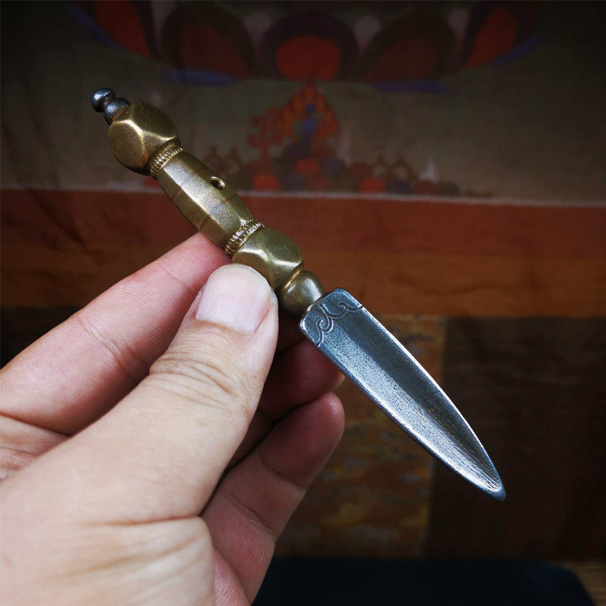 Gandhanra Handmade Tibetan Buddhist Ritual Implement - Kila -Dorje Phurba,Made of Cold Iron inlaid with Brass,5.1".The handle is made of brass and the blade is made of cold iron,very delicate.Handmade by Tibetan craftsmen from Tibet in 1990's.