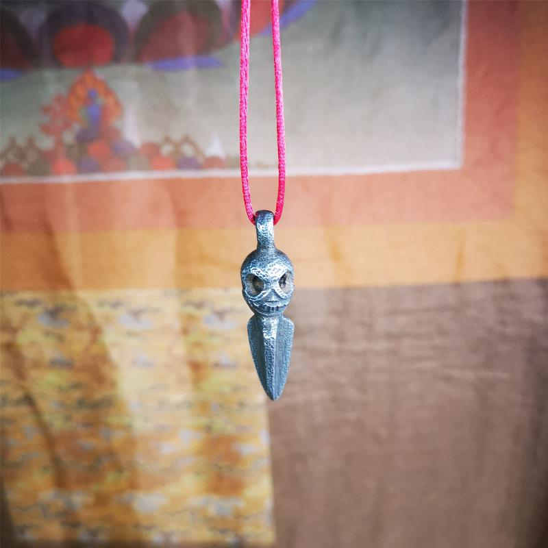 This phurba was made by Tibetan craftsmen and come from Hepo Town, Baiyu County, the birthplace of the famous Tibetan handicrafts. Its upper part is Shmashana Adhipati skull, the lower part is a Dorje Phurba