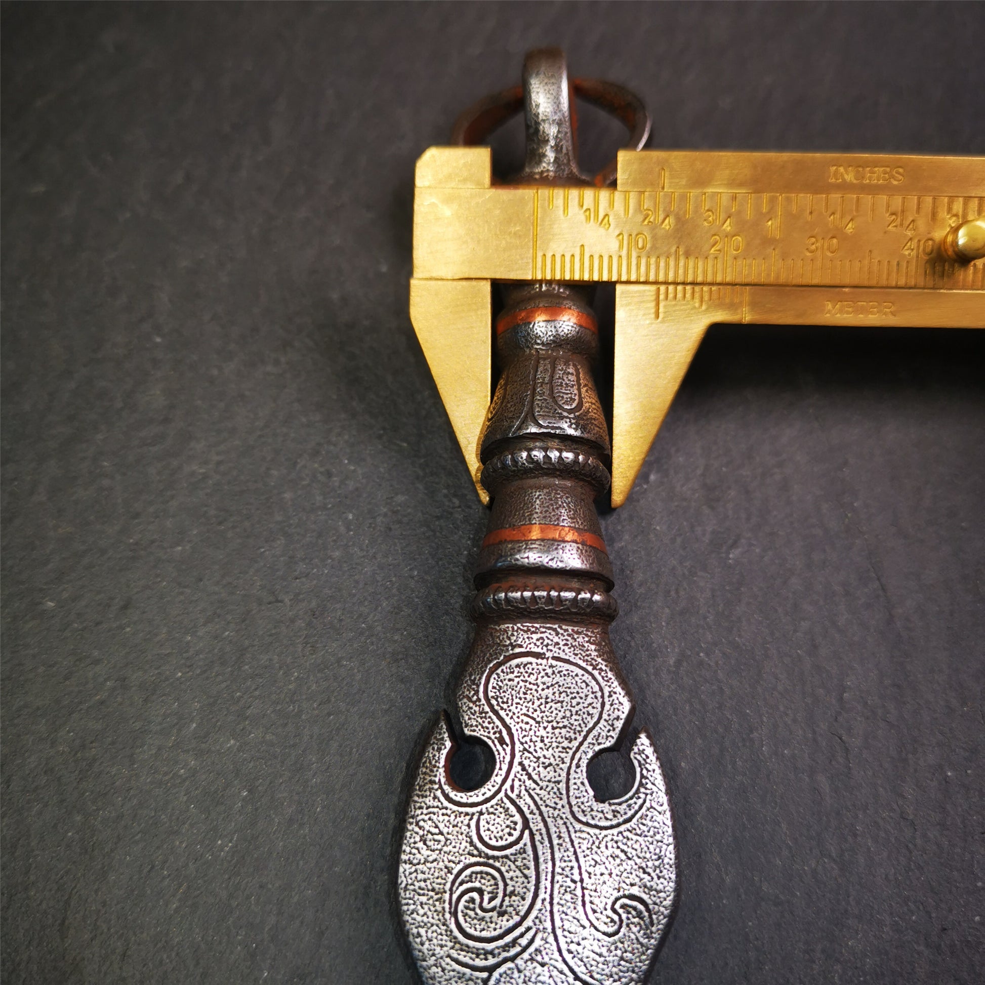 This phurba kila is handmade by Tibetan craftsmen from Tibet in 2000's,from Hepo Town, Baiyu County, the birthplace of the famous Tibetan handicrafts.  It's a kila dagger,made of cold iron, carved cloud pattern, inlaid red copper, and the half vajra on the handle,very delicate.
