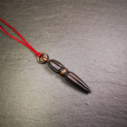 This handmade Dorje Phurba was crafted by Tibetan craftsmen from Hepo Town, Baiyu County, Tibet. The length is 2.5 inches,black color,the upper part is a vajra, and the lower part is a phurba. A copper wire is inlaid on the waist of the phurba.