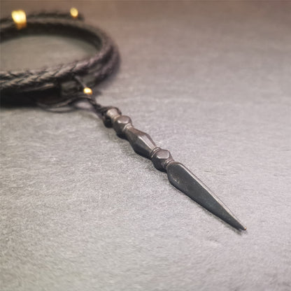 This handmade Dorje Phurba was crafted by Tibetan craftsmen from Hepo Town, Baiyu County, Tibet. The length is 2.2 inches,black color,the upper part is a vajra, and the lower part is a phurba.