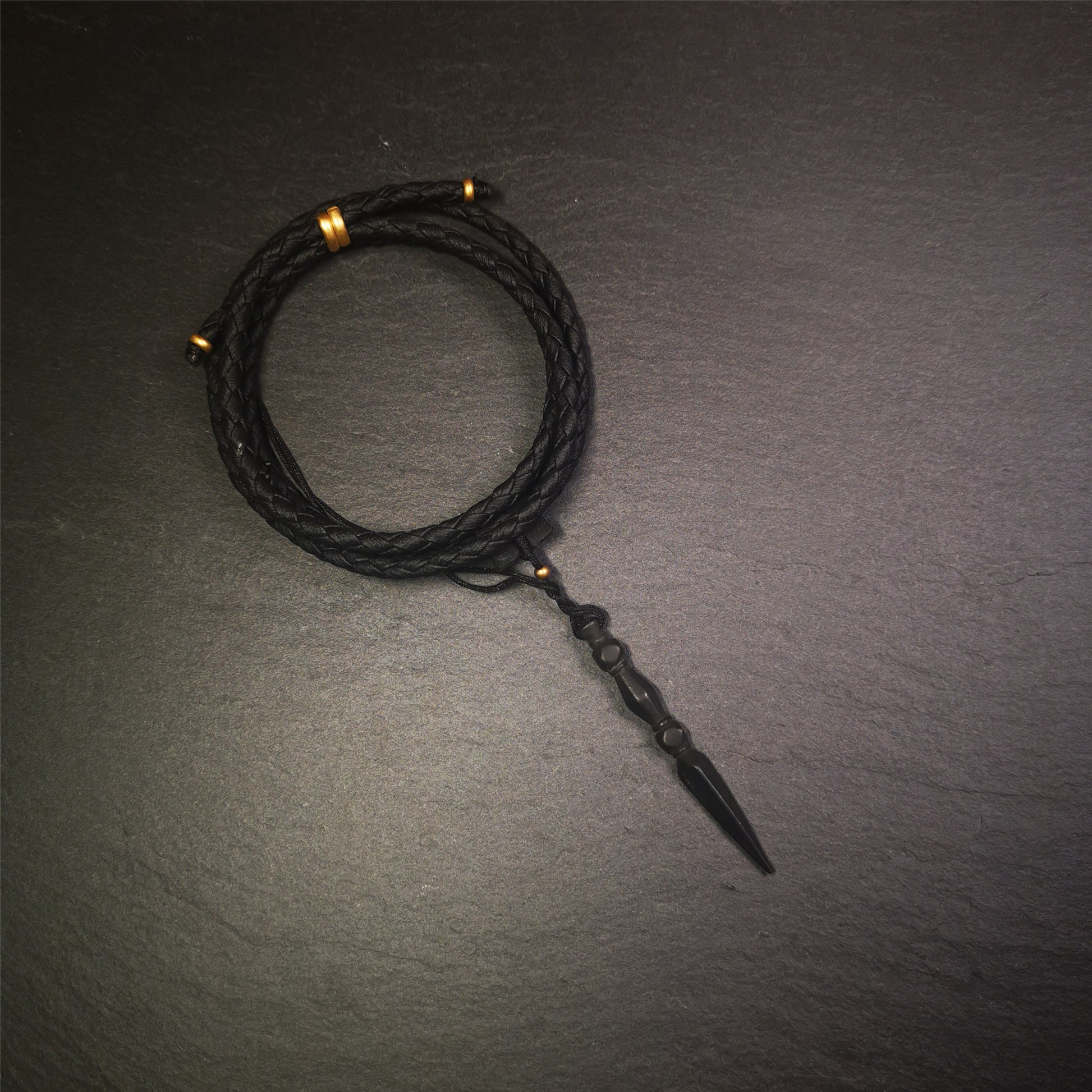 This handmade Dorje Phurba was crafted by Tibetan craftsmen from Hepo Town, Baiyu County, Tibet. The length is 2.2 inches,black color,the upper part is a vajra, and the lower part is a phurba.