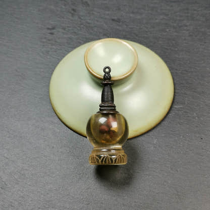 Buddhist Amulet,Crystal Stupa Pendant,Pagoda,Buddhist Tower,Gau Shrine - Tibetan Buddhist amulet, close-up detail
