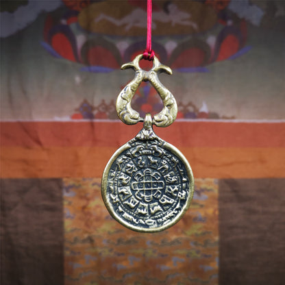 This Sipaho amulet was made by Tibetan craftsmen and come from Hepo Town, Baiyu County, Tibet.  It is round shape,made of brass.Front pattern is Tibetan Budhist calendar symbol - SIPAHO(srid pa ho),the back is the gold fish and treasure vase symbol.