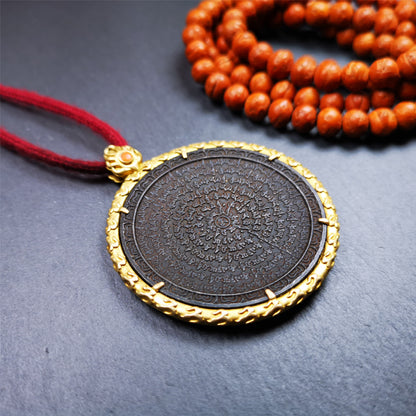 This badge is made by Tibetan craftsmen and come from Hepo Town, Baiyu County,Tibet. It is made of thokcha, edging with copper,round shape, 2.52 inche diameter. The OM MANI PADME HUM mantra arranged in concentric circles.