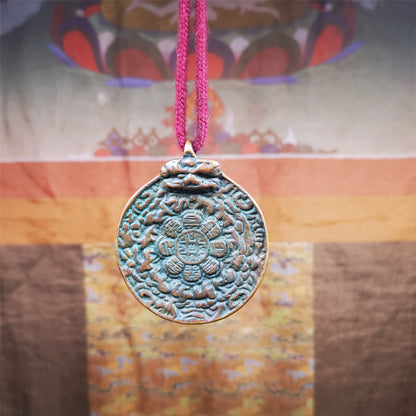 This unique melong badge was collected from Kathok Monastery for 50 years. It is round shape ,made of copper and carved 2 sided pattern. Its hanging ring is Kirtimukha,the fron is Tibetan Budhist calendar symbol - melong,and the back is mani jewel.