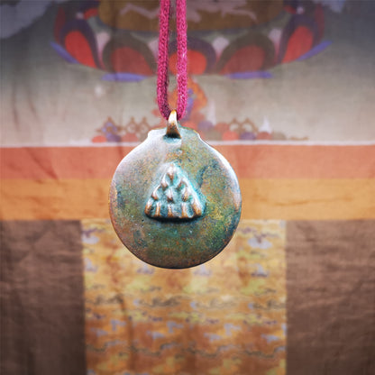 This unique melong badge was collected from Kathok Monastery for 50 years. It is round shape ,made of copper and carved 2 sided pattern. Its hanging ring is Kirtimukha,the fron is Tibetan Budhist calendar symbol - melong,and the back is mani jewel.