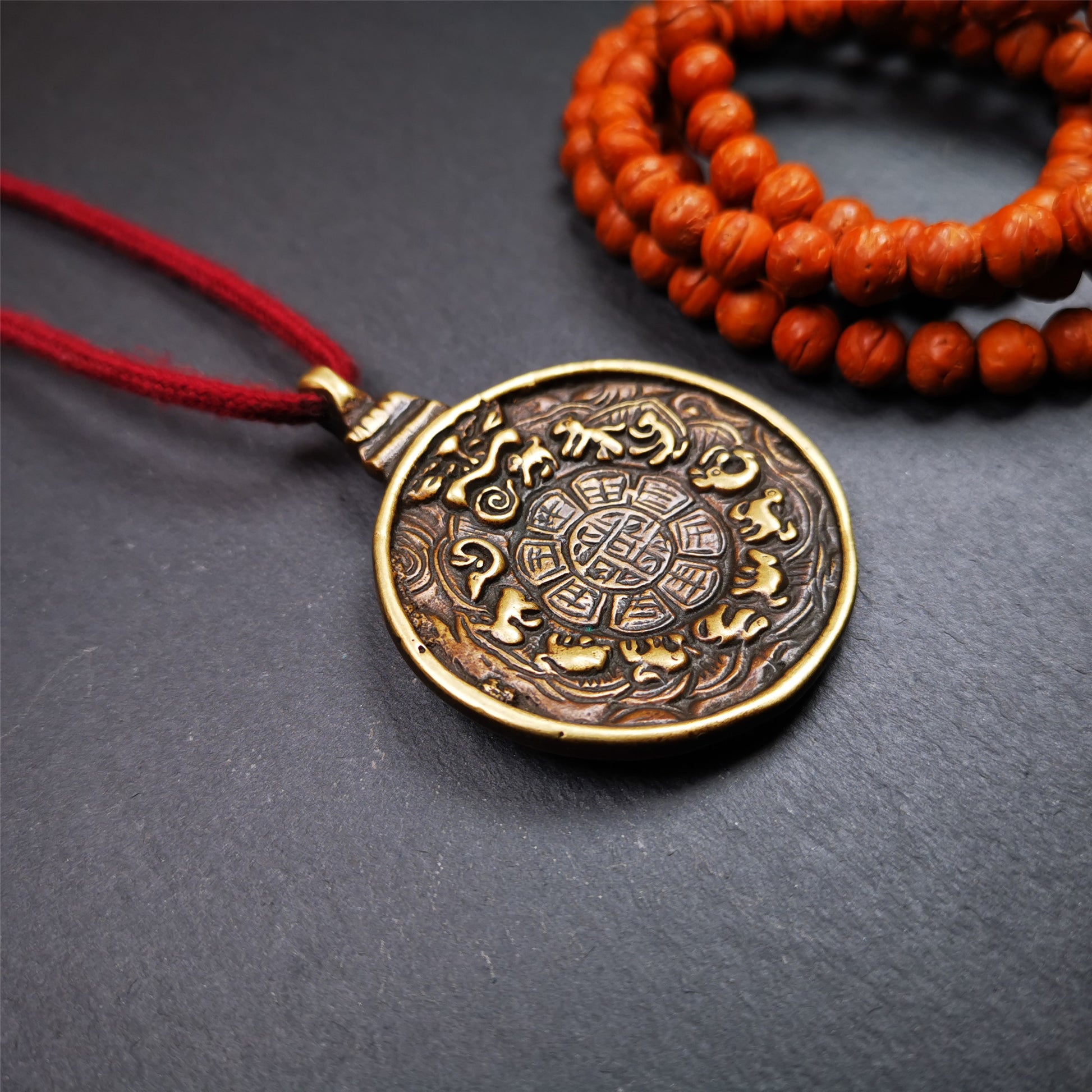 This unique Manjusri Melong Amulet was collected from Kathok Monastery,about 40 years old,bless by lama. It is round shape,made of brass,2.28 inch diameter.The front pattern is Tibetan Budhist calendar symbol - SIPAHO(srid pa ho),the back is Manjusri . You can make it into pendant or keychain, or just put it on your desk,as an ornament.