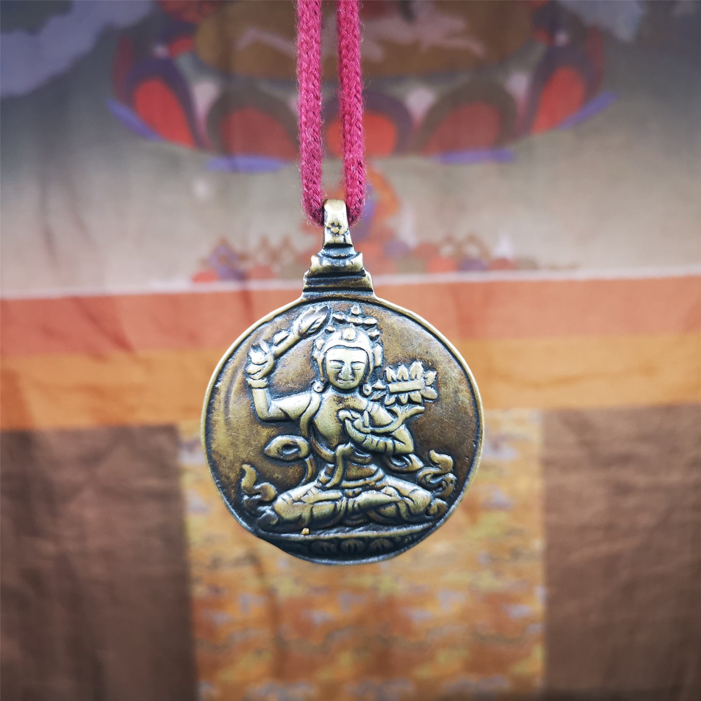 This unique Manjusri Melong Amulet was collected from Kathok Monastery,about 40 years old,bless by lama. It is round shape,made of brass,2.28 inch diameter.The front pattern is Tibetan Budhist calendar symbol - SIPAHO(srid pa ho),the back is Manjusri . You can make it into pendant or keychain, or just put it on your desk,as an ornament.