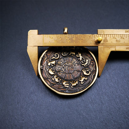 This unique Manjusri Melong Amulet was collected from Kathok Monastery,about 40 years old,bless by lama. It is round shape,made of brass,2.28 inch diameter.The front pattern is Tibetan Budhist calendar symbol - SIPAHO(srid pa ho),the back is Manjusri . You can make it into pendant or keychain, or just put it on your desk,as an ornament.