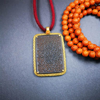 Black Om Melong 2.52" - Tibetan Buddhist art, detailed view