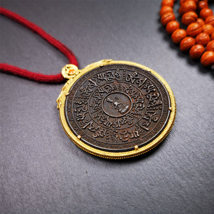 This badge was made by Tibetan craftsmen and come from Hepo Town, Baiyu County,Tibet. It is made of thokcha, edging with copper, 2.1 diameter. The mantra Om Mani Padme Hum is arranged in concentric circles around the chenrezig.