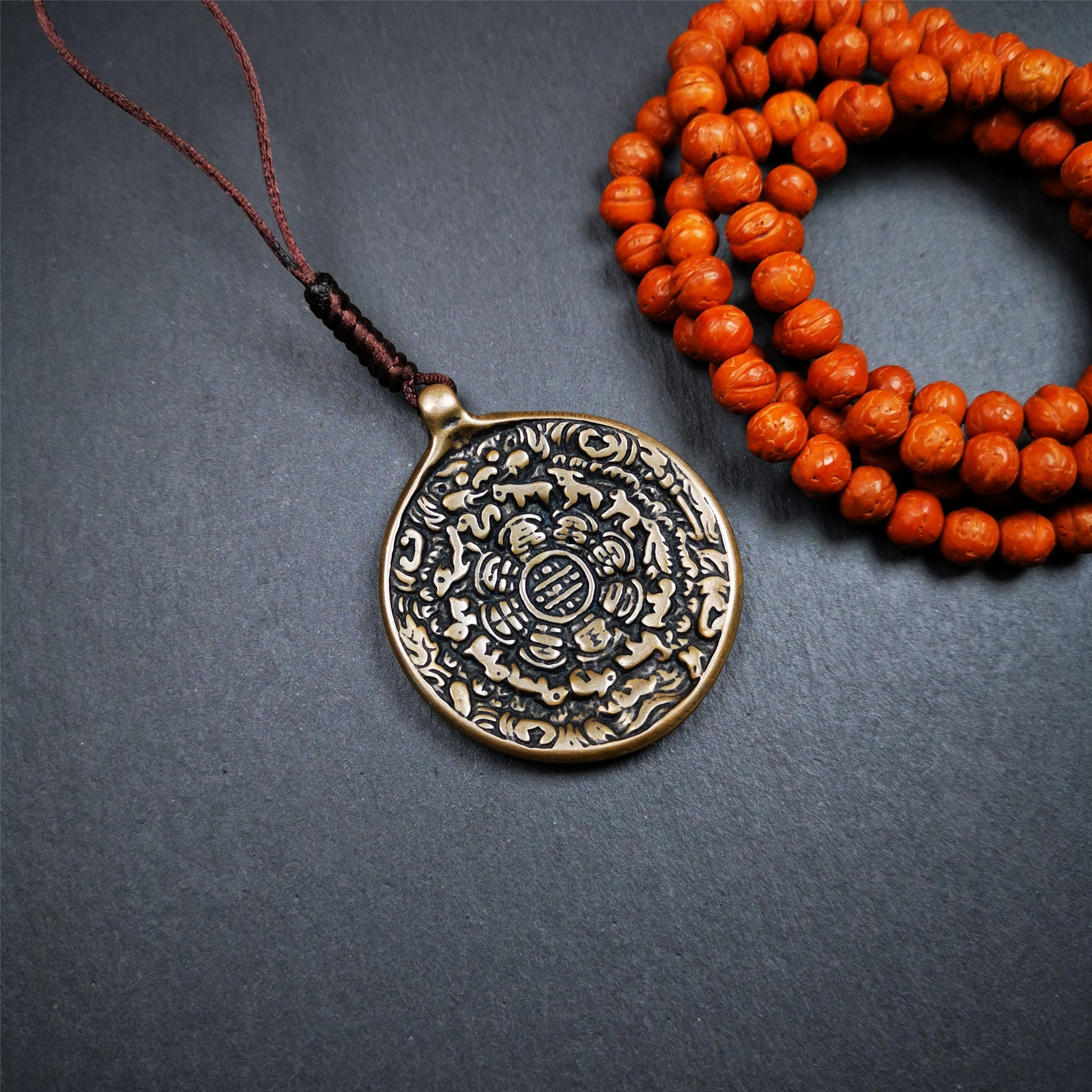 This sipaho badge was made by Tibetan craftsmen and come from Hepo Town, Baiyu County, the birthplace of the famous Tibetan handicrafts. It is round shape,made of brass,1.88".The pattern is Tibetan Budhist Protective Symbol - SIPAHO(srid pa ho).