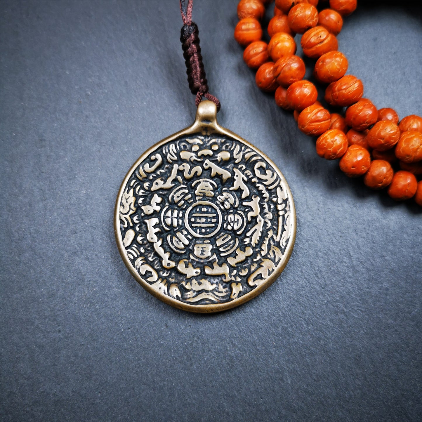 This sipaho badge was made by Tibetan craftsmen and come from Hepo Town, Baiyu County, the birthplace of the famous Tibetan handicrafts. It is round shape,made of brass,1.88".The pattern is Tibetan Budhist Protective Symbol - SIPAHO(srid pa ho).