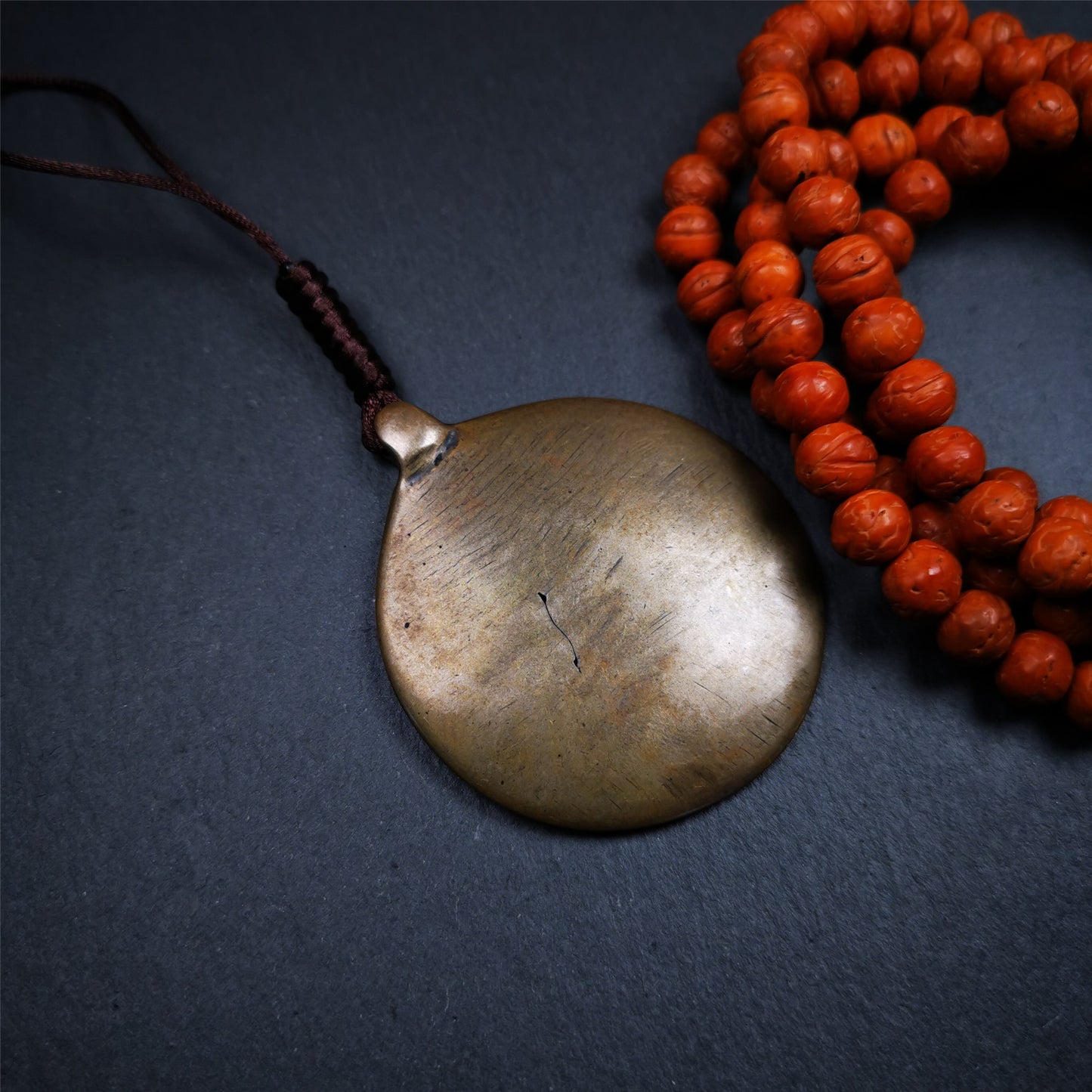 This sipaho badge was made by Tibetan craftsmen and come from Hepo Town, Baiyu County, the birthplace of the famous Tibetan handicrafts. It is round shape,made of brass,1.88".The pattern is Tibetan Budhist Protective Symbol - SIPAHO(srid pa ho).