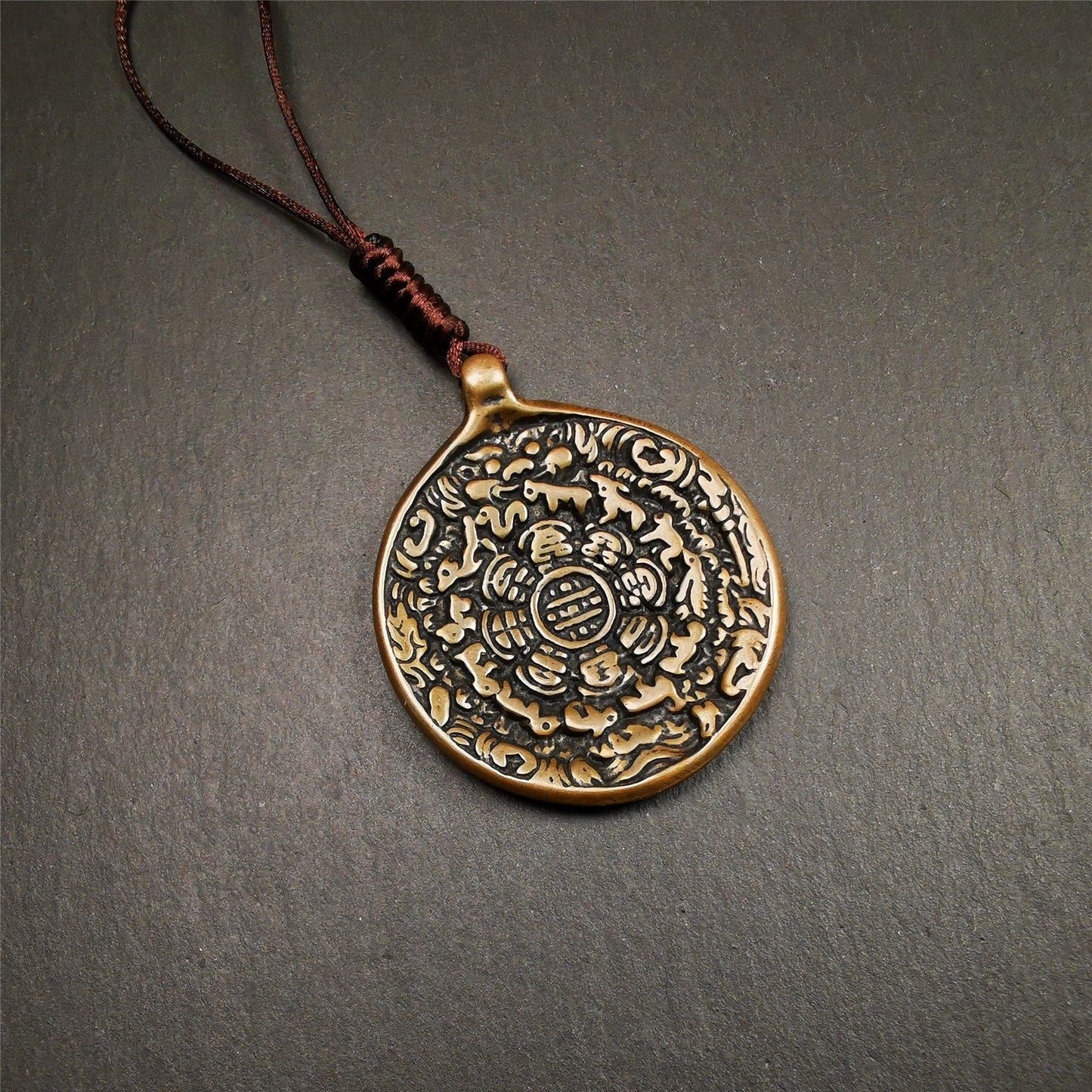 This sipaho badge was made by Tibetan craftsmen and come from Hepo Town, Baiyu County, the birthplace of the famous Tibetan handicrafts. It is round shape,made of brass,1.88".The pattern is Tibetan Budhist Protective Symbol - SIPAHO(srid pa ho).