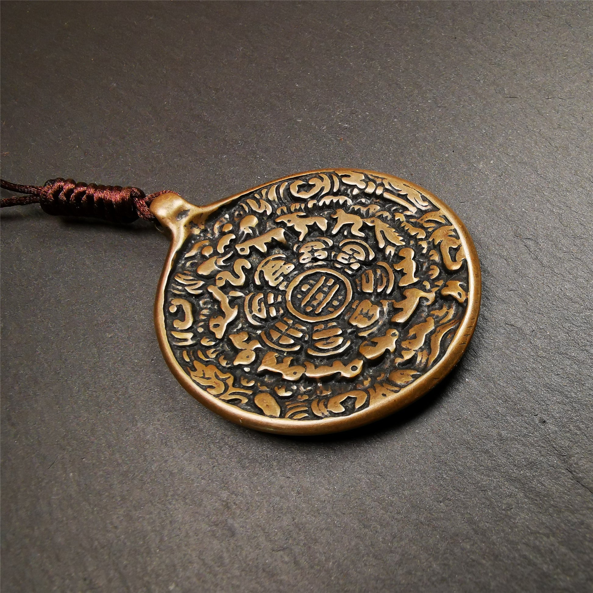 This sipaho badge was made by Tibetan craftsmen and come from Hepo Town, Baiyu County, the birthplace of the famous Tibetan handicrafts. It is round shape,made of brass,1.88".The pattern is Tibetan Budhist Protective Symbol - SIPAHO(srid pa ho).