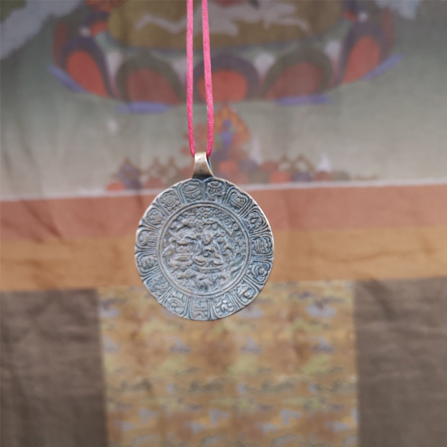 This old Longevity Badge was collected from Ganzi County Tibet about 100 years. It is made of copper,the theme is Shou-lao(the god of longevity) surrounded by the symbols of Ashtamangala. He is the ancient Chinese God of Longevity, represent Amitayus
