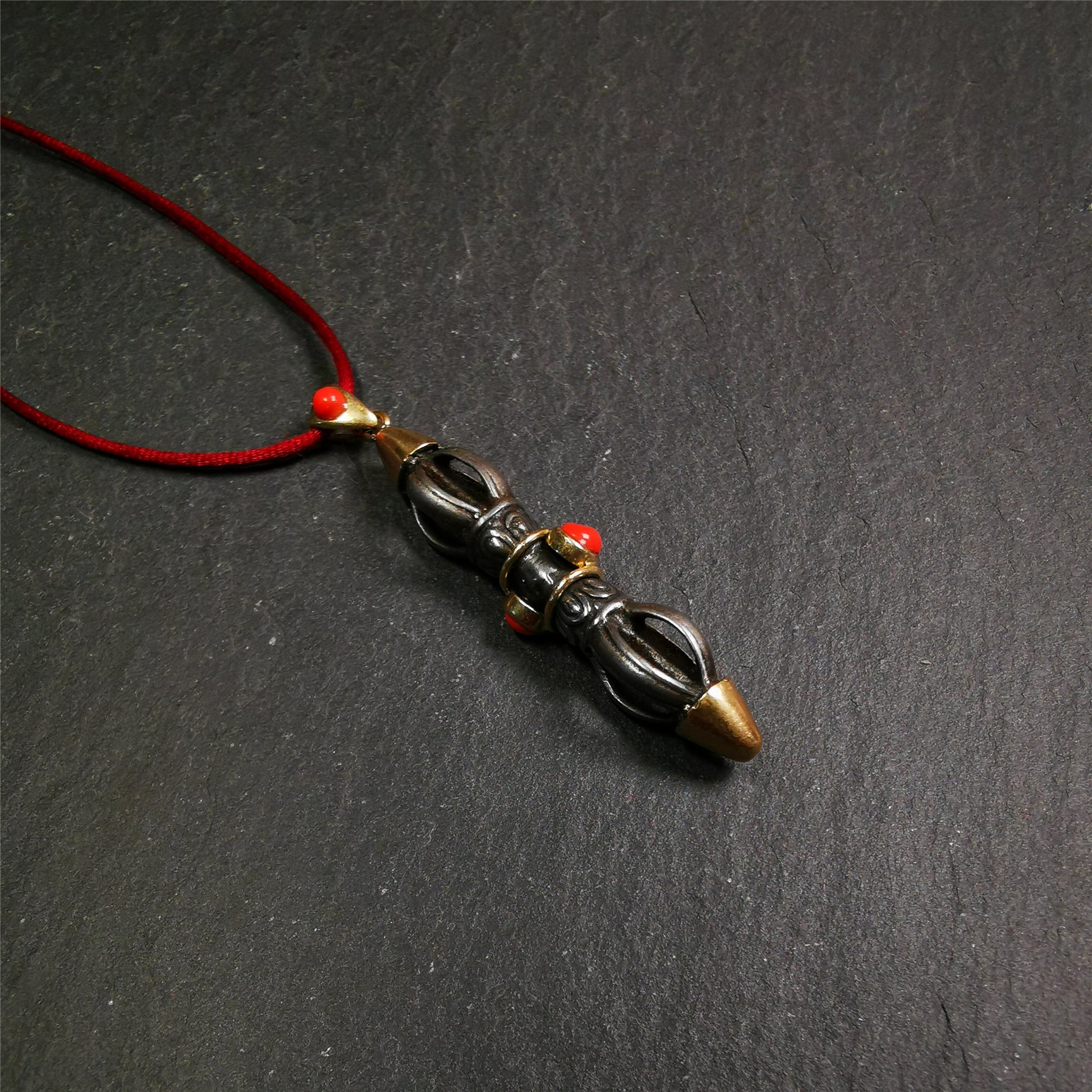 This unique vajra pendant was handmade by Tibetan craftsmen from Tibet in 1990s,from Hepo Town, Baiyu County, the birthplace of the famous Tibetan handicrafts. It is five-pronged Vajra,made of cold iron, 1.96 inch height.