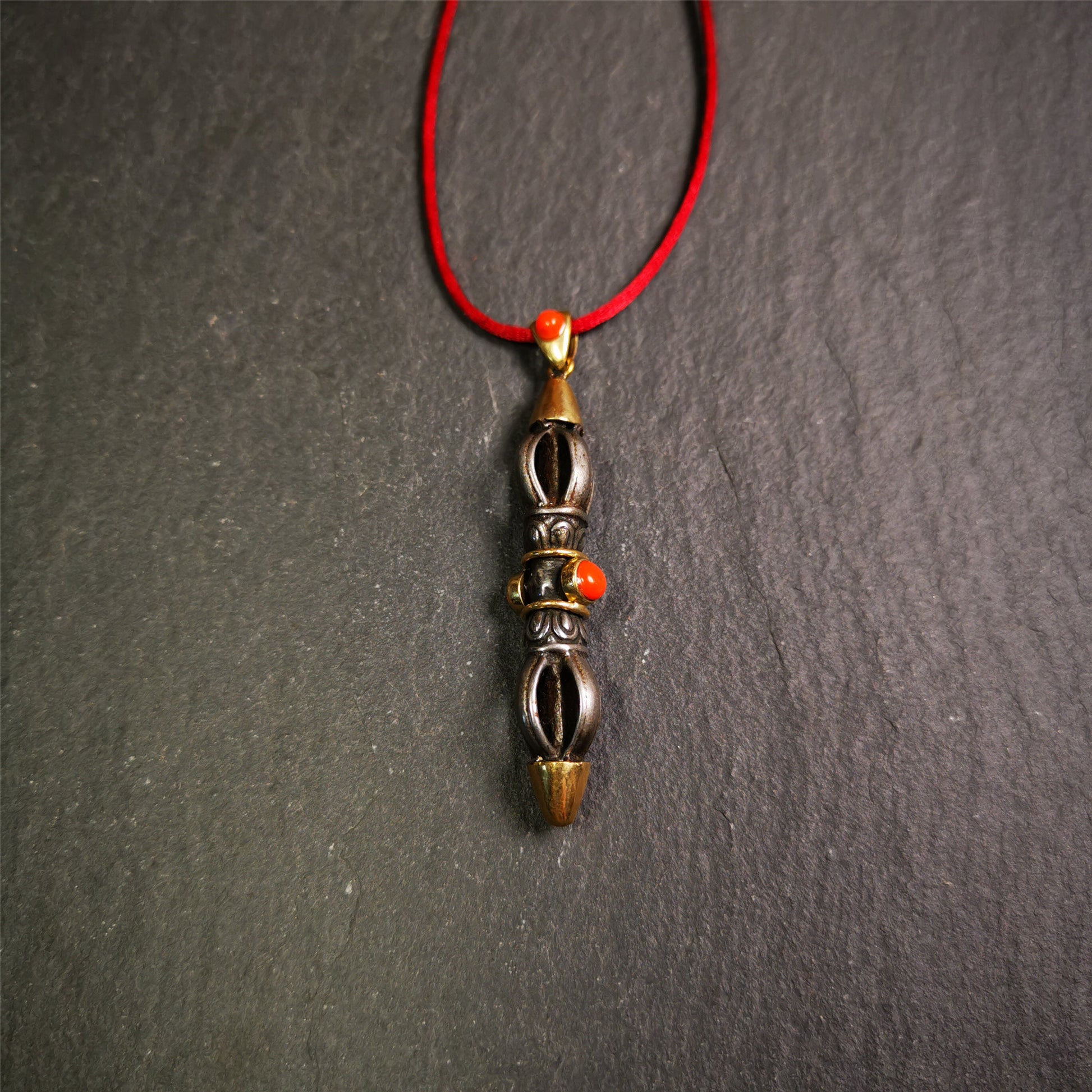This unique vajra pendant was handmade by Tibetan craftsmen from Tibet in 1990s,from Hepo Town, Baiyu County, the birthplace of the famous Tibetan handicrafts. It is five-pronged Vajra,made of cold iron, 1.96 inch height.