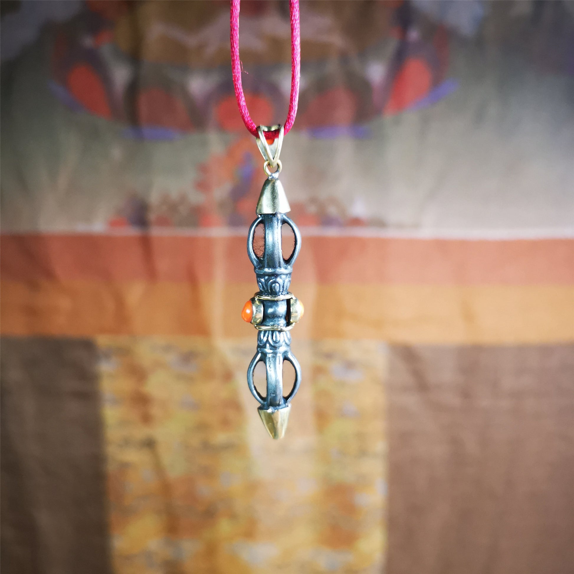 This unique vajra pendant was handmade by Tibetan craftsmen from Tibet in 1990s,from Hepo Town, Baiyu County, the birthplace of the famous Tibetan handicrafts. It is five-pronged Vajra,made of cold iron, 1.96 inch height.